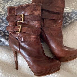 Michael Kors brown dis stressed leather heel boots.
